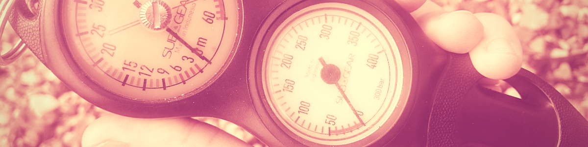 How can I use less air when scuba diving?